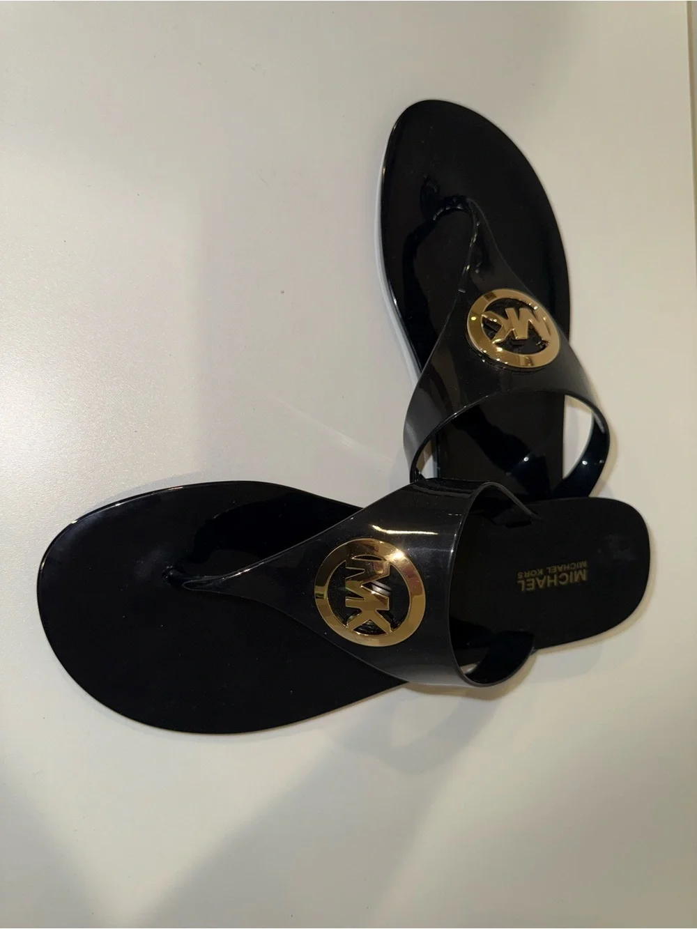 Michael Kors Black Jelly Thong Sandals with Gold MK Emblem